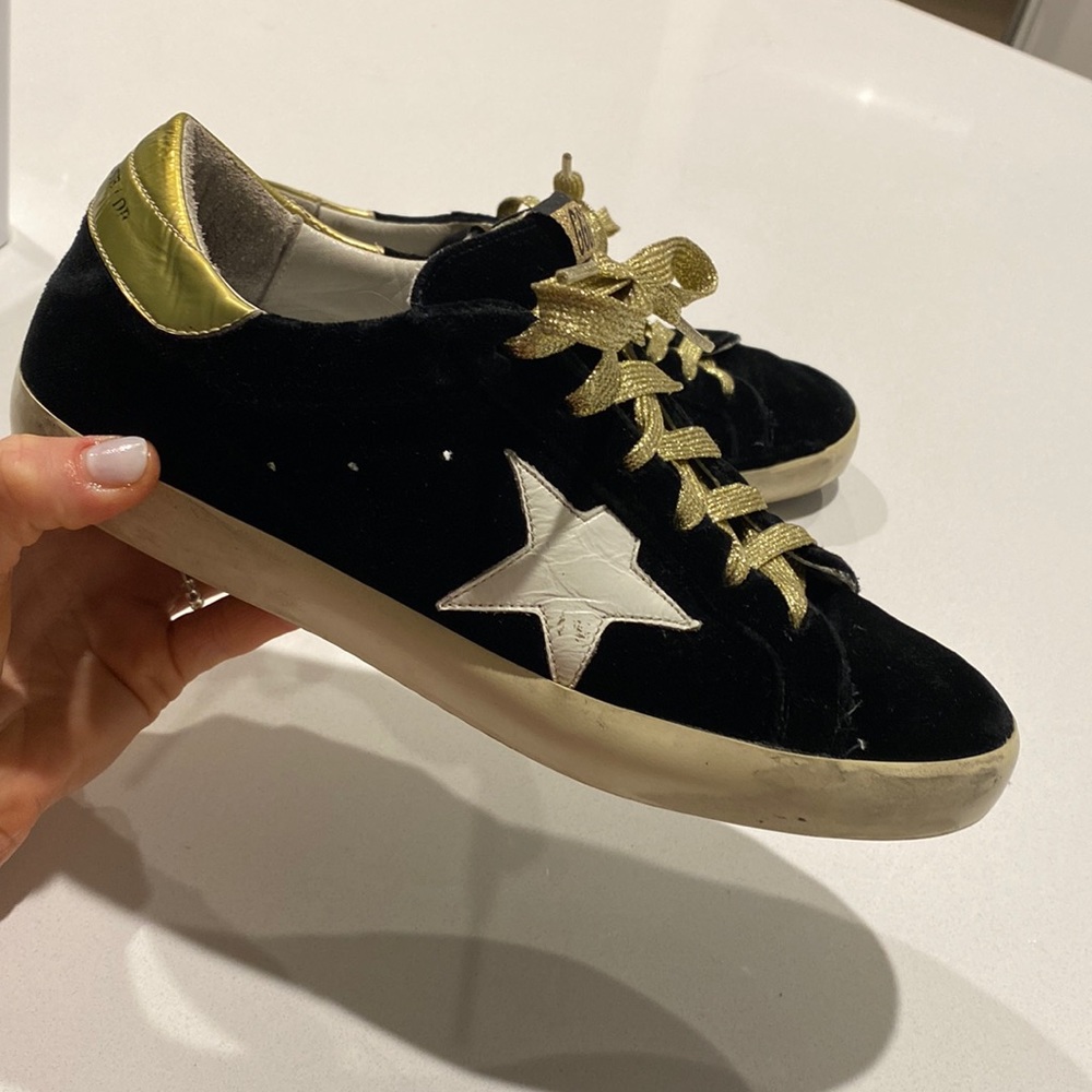 Discontinued Black velvet-gold trim Golden goose superstar sneakers.